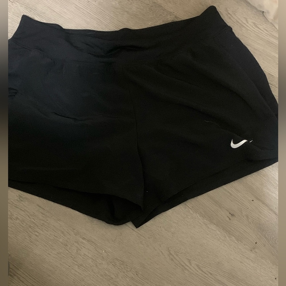 NIKE ladies Dri fit black shorts. Size large.